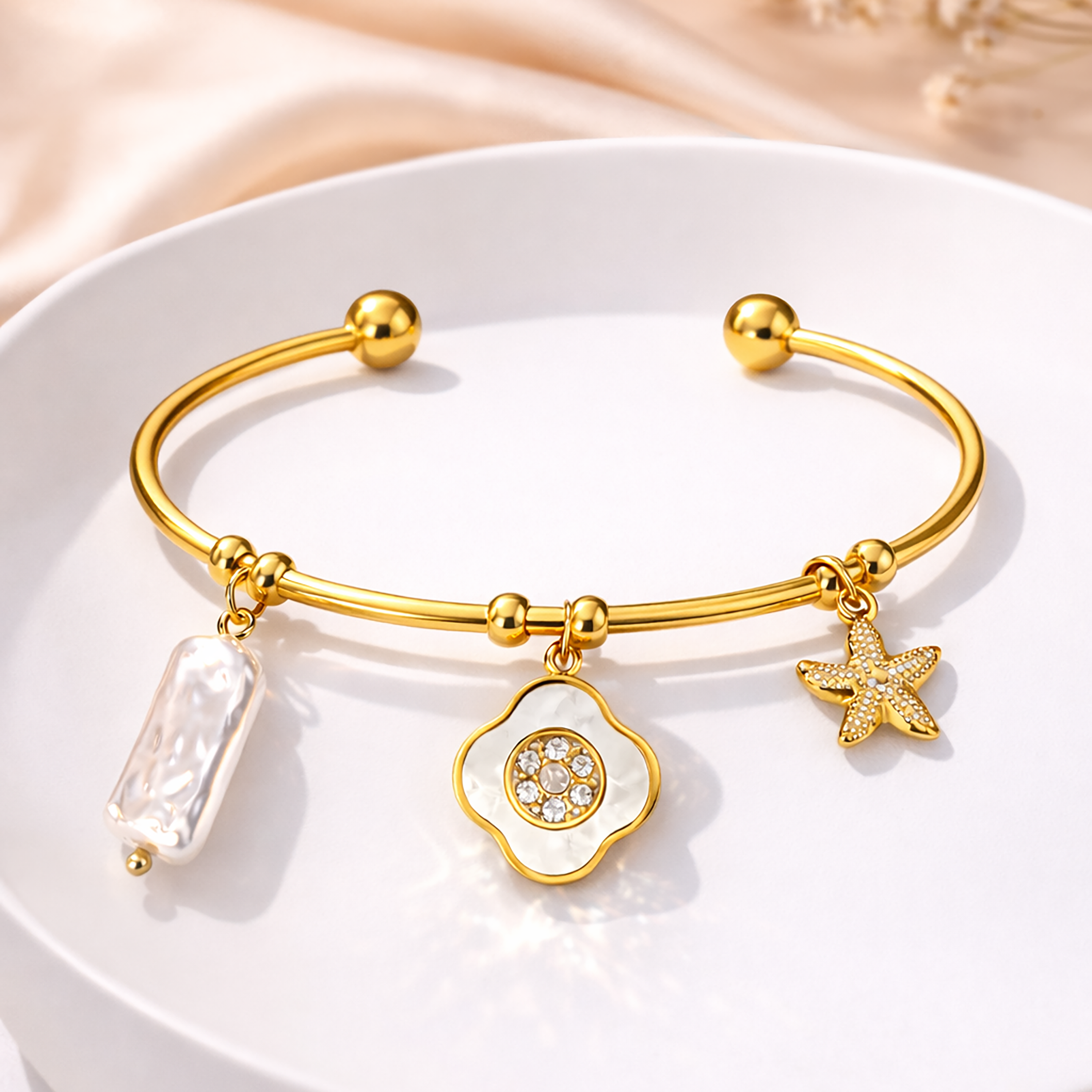 Gold-Plated Stainless Steel Charm Bracelet for Women with Pearl Bar and Crystal Floral Charm