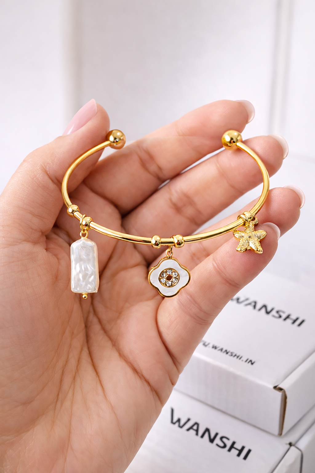 Gold-Plated Stainless Steel Charm Bracelet for Women with Pearl Bar and Crystal Floral Charm
