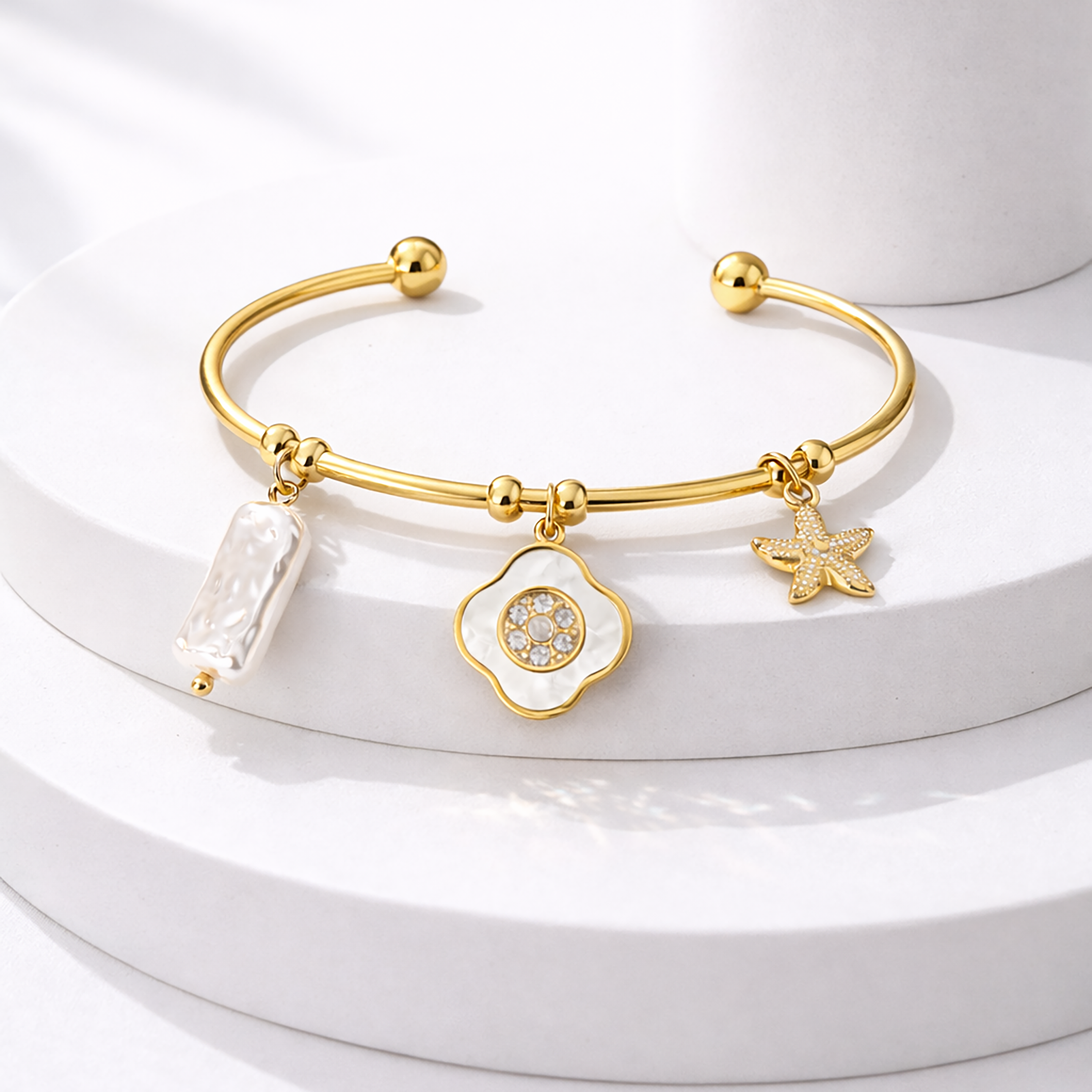 Gold-Plated Stainless Steel Charm Bracelet for Women with Pearl Bar and Crystal Floral Charm